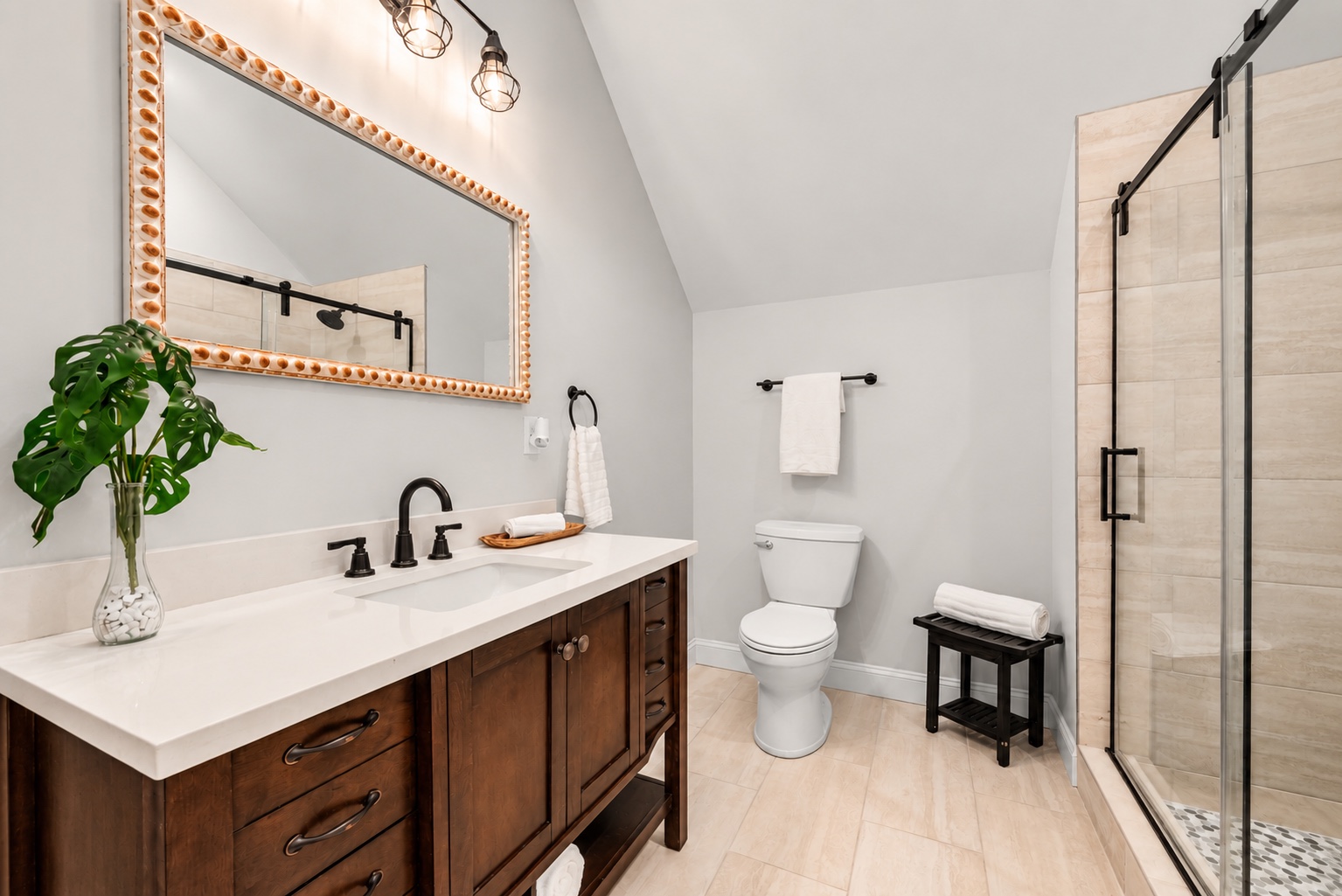 Secondary bathroom at 23 Cornerstone Dr with vanity and tiled shower