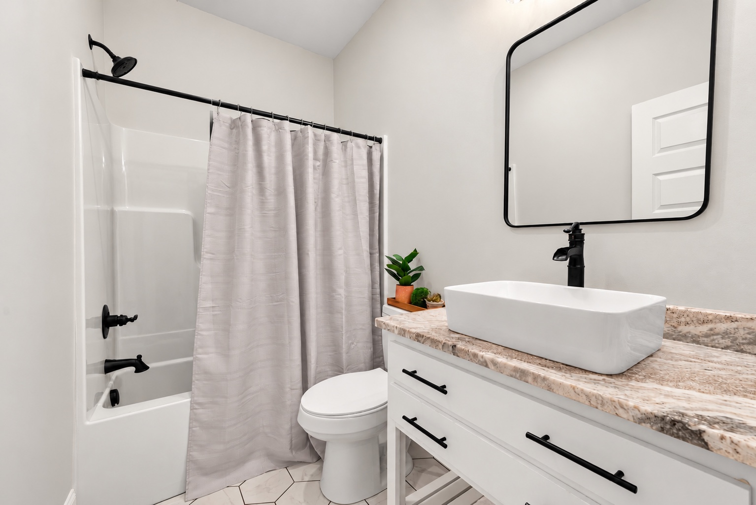 Virtually staged bathroom on the finished upper level at 23 Cornerstone Dr