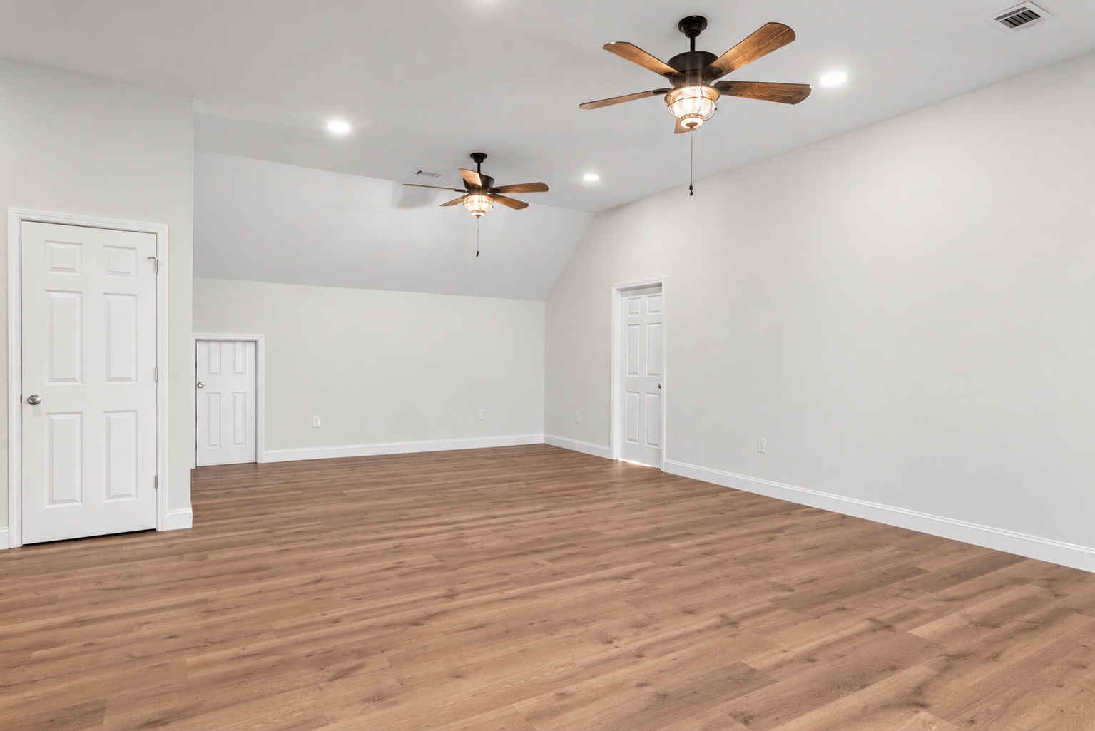 Reverse view of the unfurnished bonus room on the finished upper level at 23 Cornerstone Dr