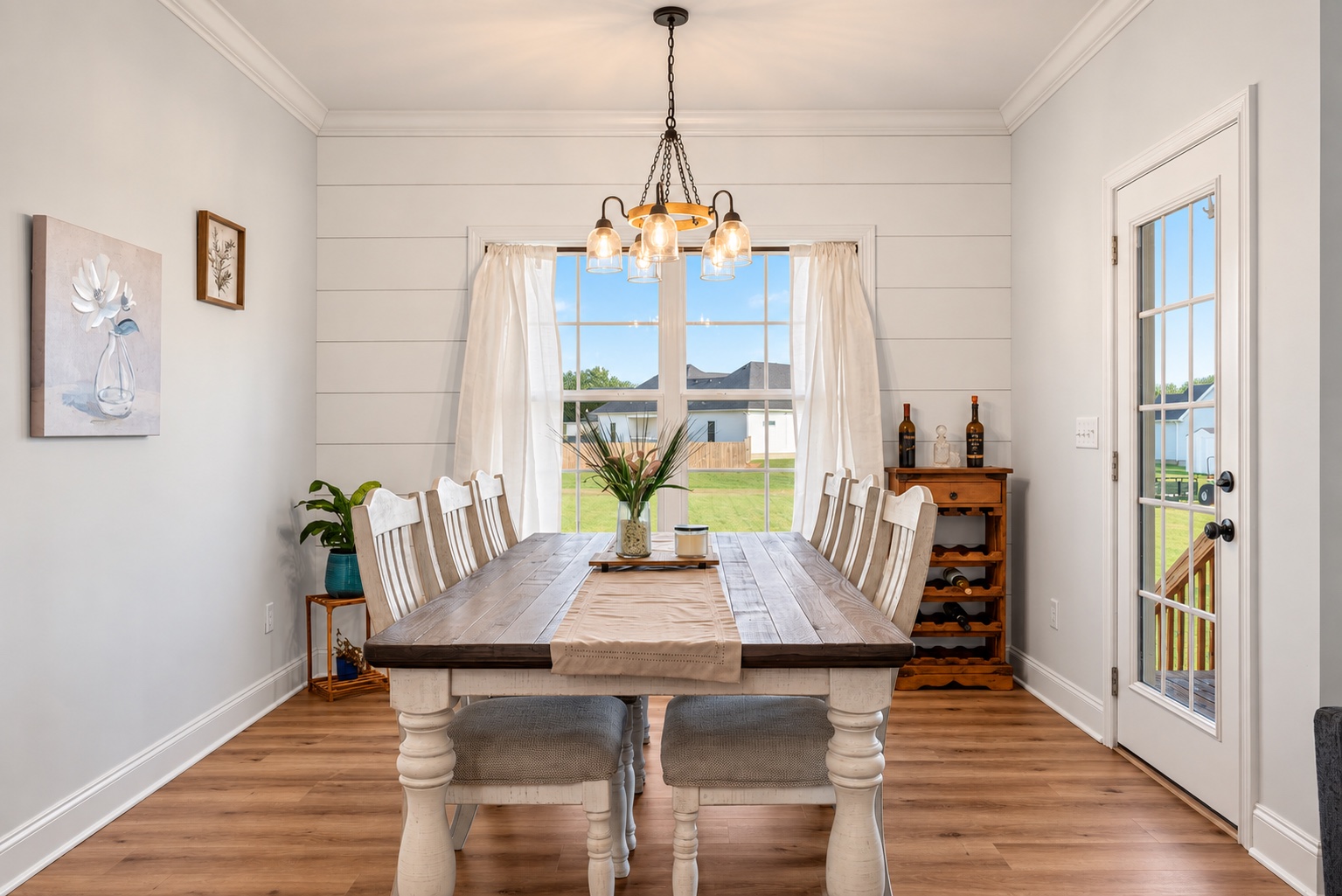 Dining room at 23 Cornerstone Dr with backyard views